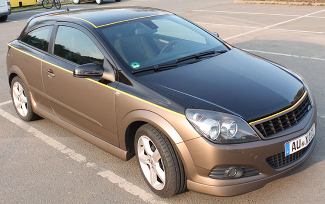 autofolierung chemnitz dresden auto bekleben lassen carbon opel astra